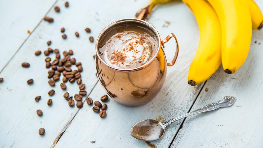 Vanilla, banana and coffee smoothie in a mug